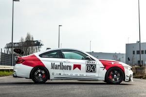 Manhart MH4 GTR Tuning Carbon-Karosserieteile Felgen Tieferlegung Leistungsteigerung Folierung BMW F82 M4 DTM Champion Edition
