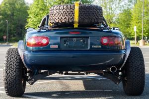 Mazda MX-5 NA 1994 Tuning Offroad-Umbau Fahrwerk Höherlegung Felgen Reifen Karosserie-Anpassungen Zusatzbeleuchtung Innenraum-Veredelung Roadster Versteigerung Cars & Bids